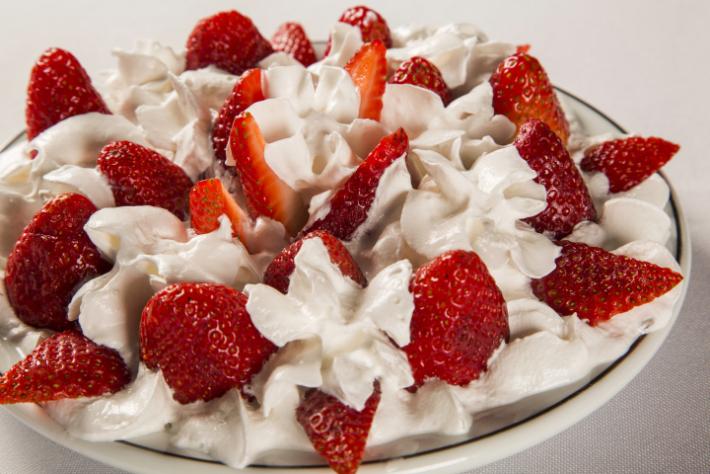 Strawberries homemade whipped cream with melon flavor